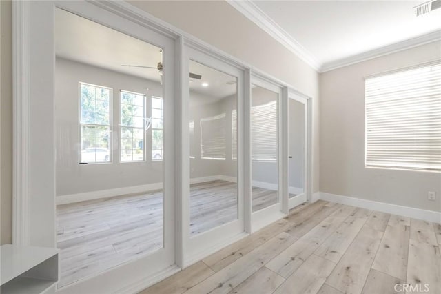 4806 W Concord Ave, Visalia, CA 93277 - entryway with crown molding, wood finished floors, a ceiling fan, and baseboards