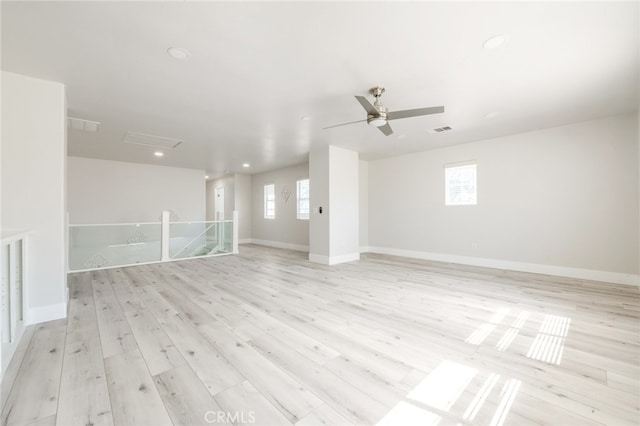 empty room featuring light hardwood / wood-style floors and ceiling fan