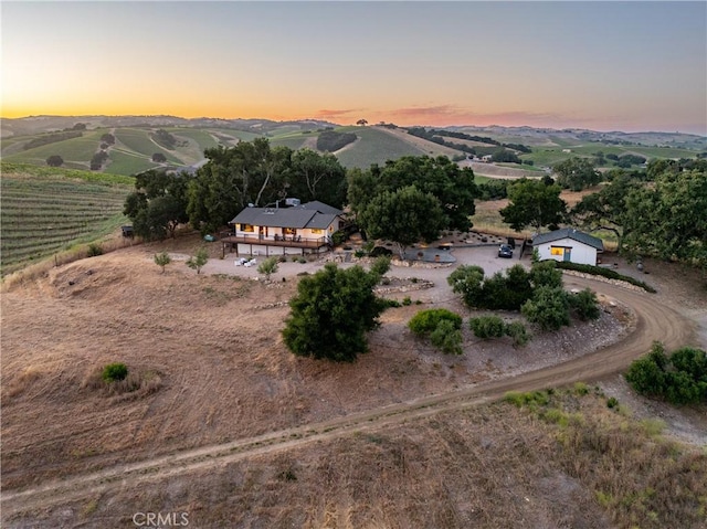 aerial view at dusk with a rural view