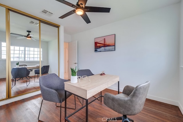 office space featuring ceiling fan and hardwood / wood-style floors