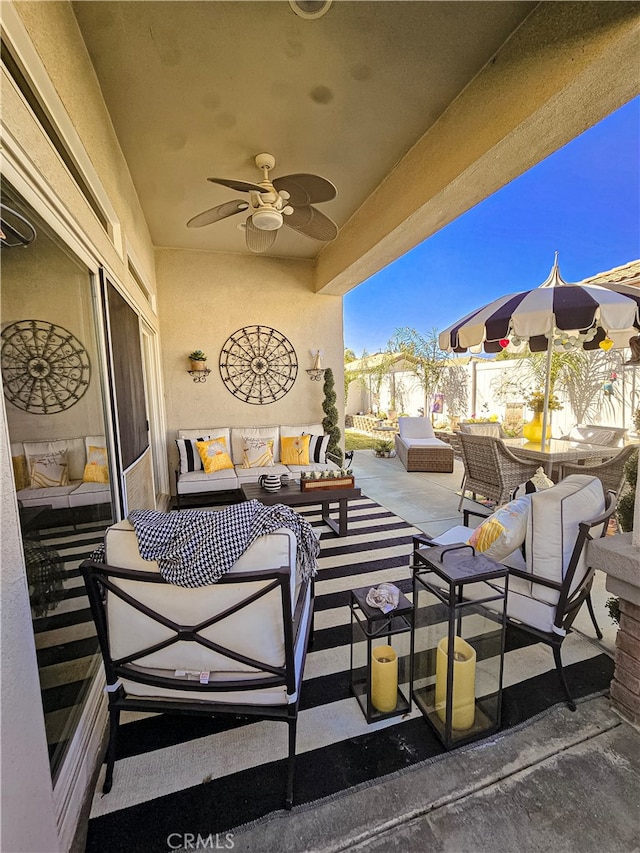 view of patio featuring ceiling fan and an outdoor hangout area