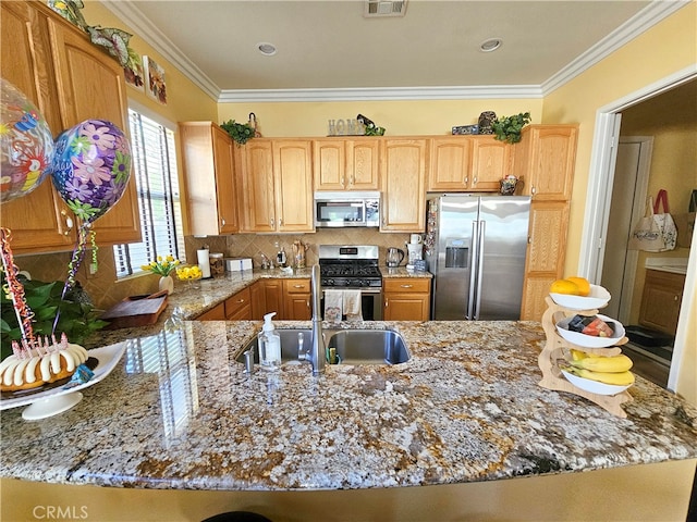 kitchen featuring light stone countertops, decorative backsplash, kitchen peninsula, ornamental molding, and stainless steel appliances