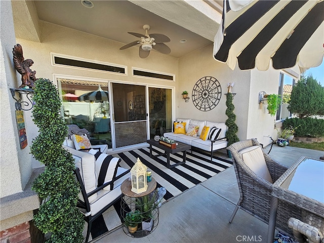 view of patio / terrace featuring an outdoor living space and ceiling fan