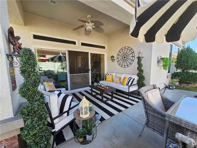 view of patio featuring outdoor lounge area and a ceiling fan