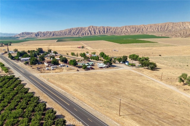 bird's eye view with a rural view and a mountain view