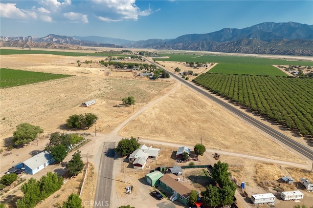 bird's eye view featuring a mountain view and a rural view