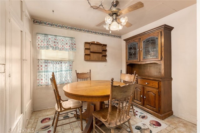 dining space featuring a ceiling fan