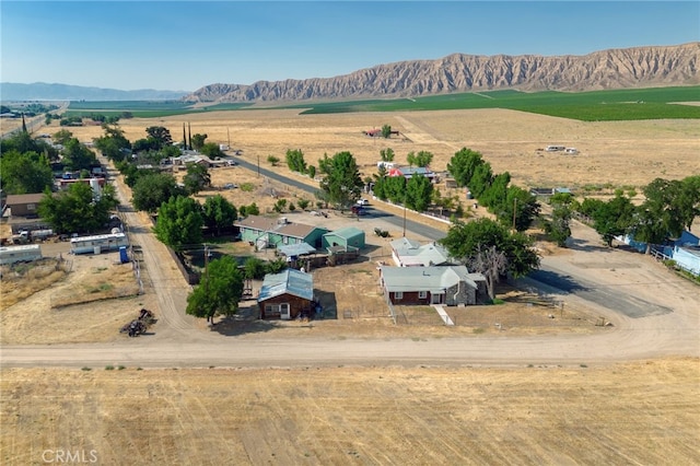 aerial view featuring a mountain view and a rural view