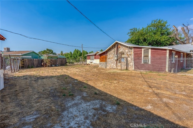 view of yard with fence