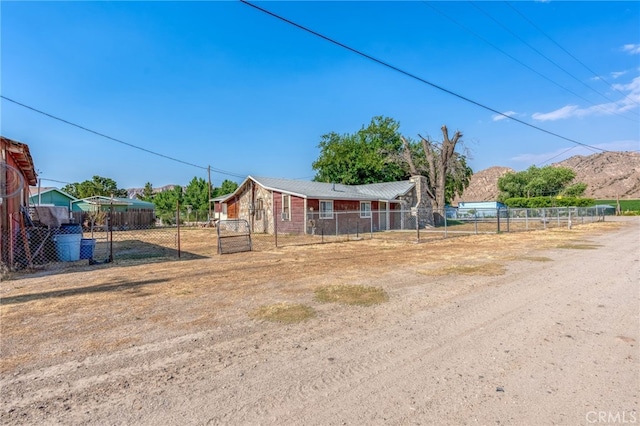 view of front of house with fence