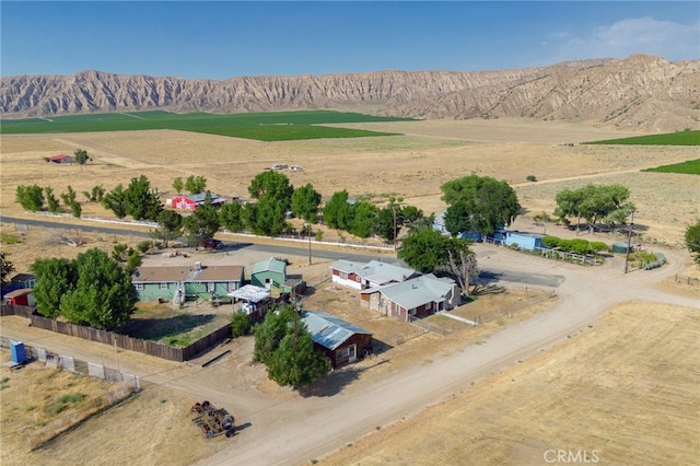 bird's eye view featuring a rural view and a mountain view