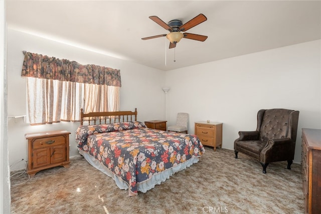 carpeted bedroom featuring a ceiling fan