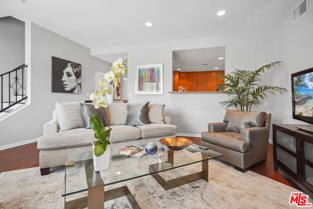 living room with hardwood / wood-style flooring