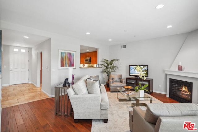 living room with hardwood / wood-style flooring