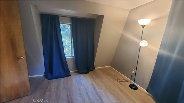 empty room featuring hardwood / wood-style floors