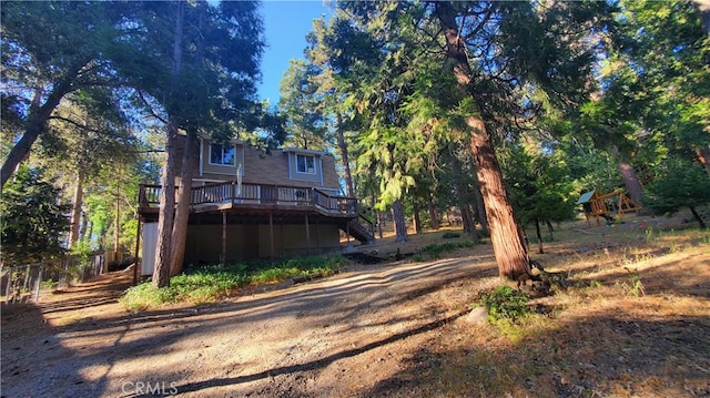 view of yard with a wooden deck