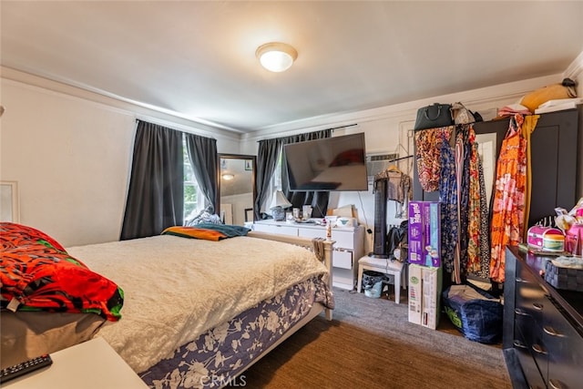 carpeted bedroom featuring ornamental molding