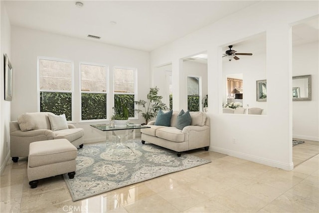 interior space featuring ceiling fan