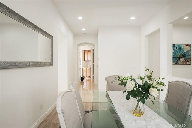 dining room with hardwood / wood-style flooring