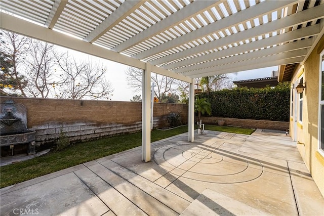 view of patio / terrace featuring a pergola