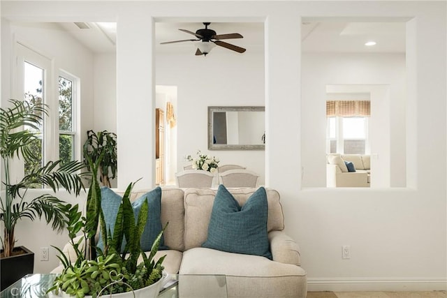 living room with ceiling fan