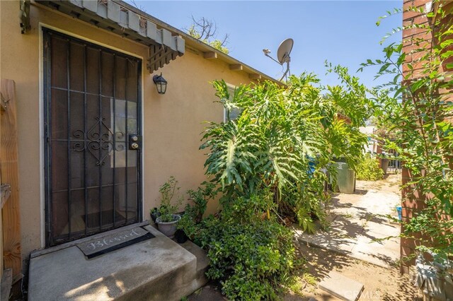 property entrance with a patio area