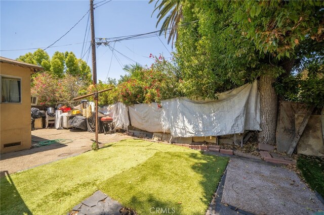 view of yard with a patio area