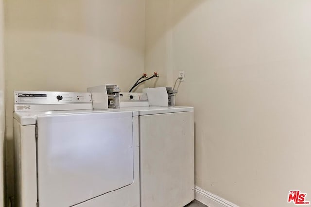 laundry room featuring washer and clothes dryer