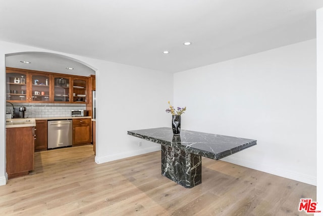 dining area with light hardwood / wood-style floors