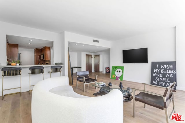 living room featuring light hardwood / wood-style floors