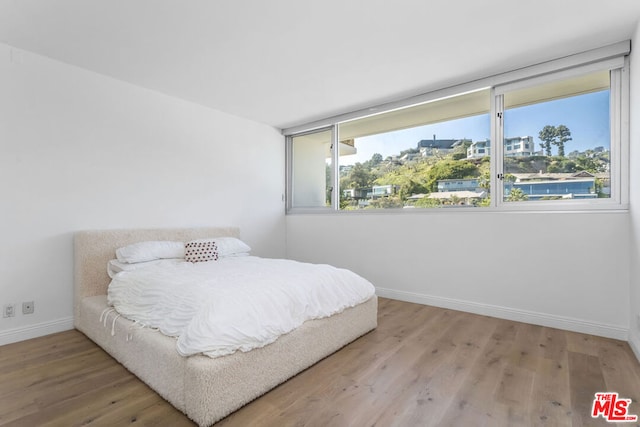 bedroom featuring light hardwood / wood-style flooring