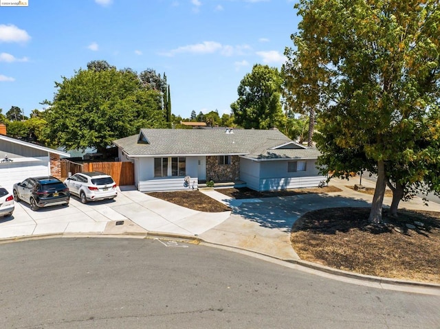 view of front of property with an outdoor structure