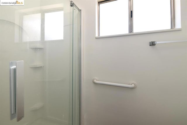 bathroom featuring walk in shower