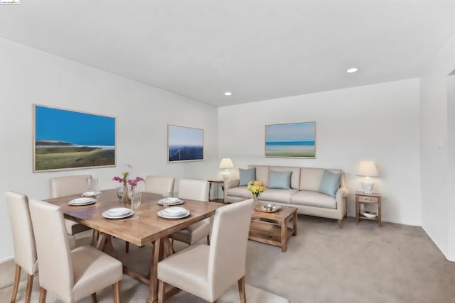 view of carpeted dining space