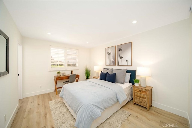 bedroom featuring light hardwood / wood-style floors