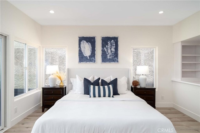 bedroom featuring light hardwood / wood-style flooring