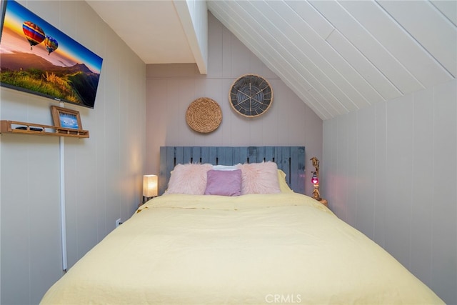 bedroom with vaulted ceiling