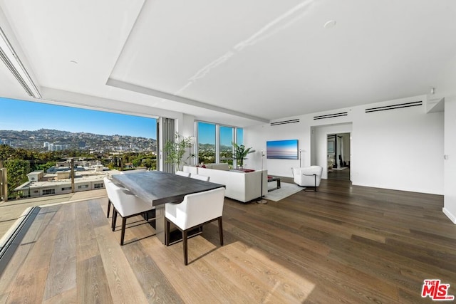 dining area featuring hardwood / wood-style floors