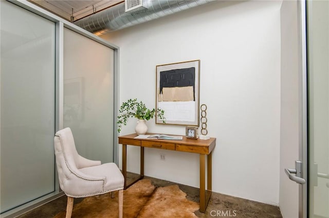 interior space featuring concrete flooring