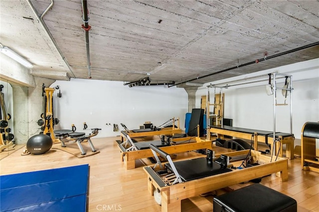 basement with wood-type flooring