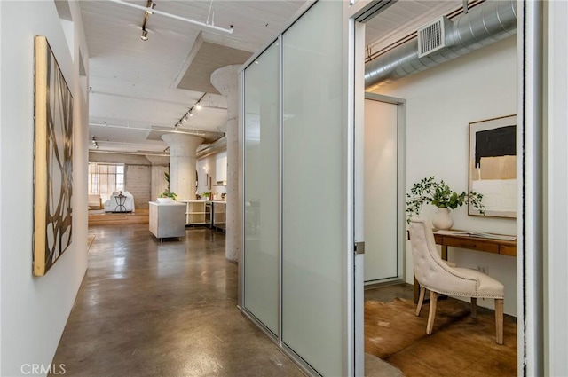 hallway with track lighting