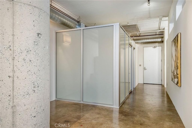 interior space with concrete flooring