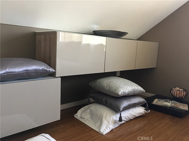 12100 Colima Rd, Whittier, CA 90604 - bedroom featuring vaulted ceiling and dark wood-type flooring
