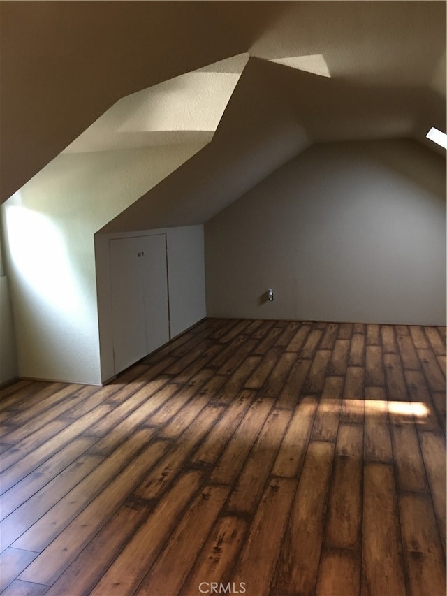 12100 Colima Rd, Whittier, CA 90604 - additional living space with lofted ceiling and dark hardwood / wood-style floors