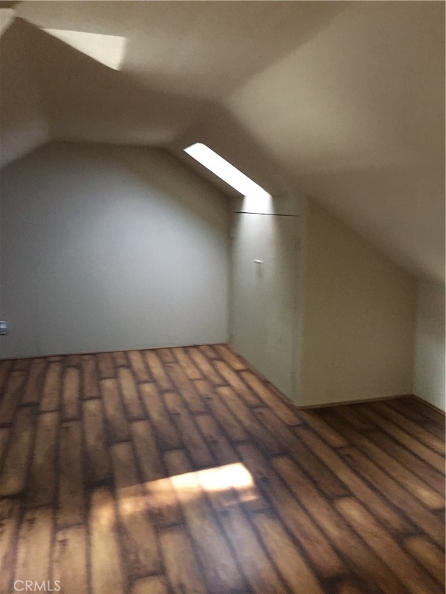 12100 Colima Rd, Whittier, CA 90604 - bonus room featuring lofted ceiling with skylight and hardwood / wood-style floors