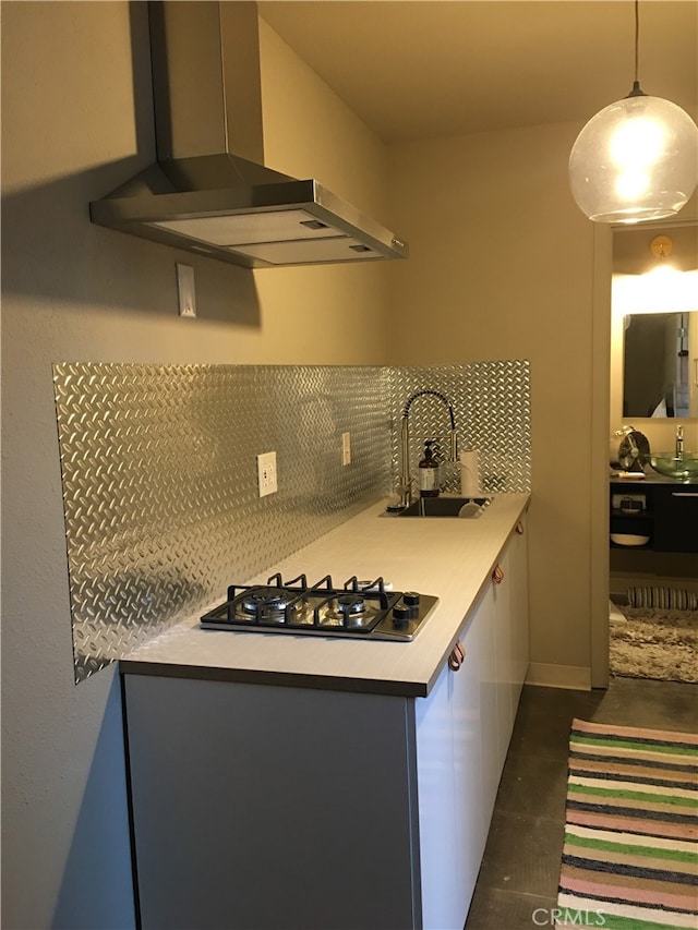 12100 Colima Rd, Whittier, CA 90604 - kitchen with tasteful backsplash, black gas stovetop, hanging light fixtures, wall chimney exhaust hood, and sink