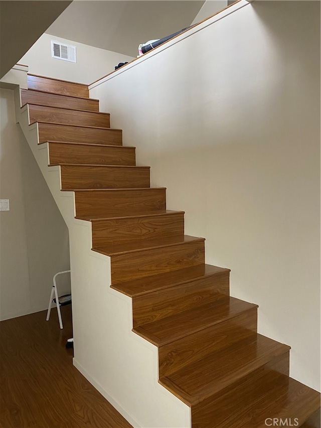 12100 Colima Rd, Whittier, CA 90604 - stairway featuring dark hardwood / wood-style floors