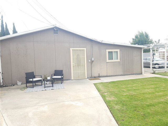 12100 Colima Rd, Whittier, CA 90604 - back of property featuring a patio and a yard