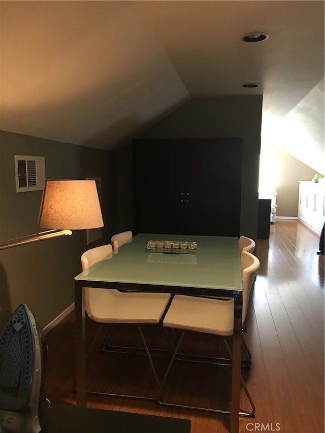 12100 Colima Rd, Whittier, CA 90604 - dining room featuring vaulted ceiling and hardwood / wood-style floors