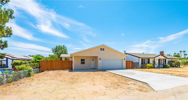 single story home with a garage